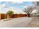 Landscaped backyard with gravel and wooden fence at 257 Colleen Dr, Las Vegas, NV 89107