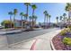 Gated community entrance with palm trees at 2615 W Gary Ave # 1035, Las Vegas, NV 89123