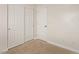 Spacious bedroom with double door closet and neutral wall color at 2730 Morning Break Ct, Las Vegas, NV 89142