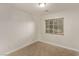 Well-lit bedroom with carpeted floor and window coverings at 2730 Morning Break Ct, Las Vegas, NV 89142