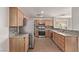 Modern kitchen, stainless steel appliances, wood cabinets at 2730 Morning Break Ct, Las Vegas, NV 89142