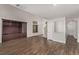 Spacious living room featuring hardwood floors and built-in shelving at 2730 Morning Break Ct, Las Vegas, NV 89142