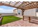 Relax under the pergola overlooking the backyard at 2730 Morning Break Ct, Las Vegas, NV 89142