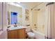 Clean bathroom with tub, shower combo, and wood vanity at 2821 White Peaks Ave, North Las Vegas, NV 89081