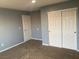Neutral bedroom featuring closet and neutral color scheme at 2821 White Peaks Ave, North Las Vegas, NV 89081