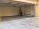 Attached two-car garage with mirrored wall and ample space at 2821 White Peaks Ave, North Las Vegas, NV 89081