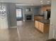 Kitchen with island, granite countertops, and stainless steel appliances at 2821 White Peaks Ave, North Las Vegas, NV 89081