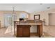 Island kitchen with granite countertops and double sink at 3041 Bublin Bay Ave, North Las Vegas, NV 89081