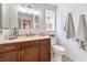 Bathroom with wood vanity, toilet and shower at 337 Seine Way # 0, Henderson, NV 89014