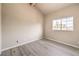 Spacious bedroom with wood floors and large window at 337 Seine Way # 0, Henderson, NV 89014