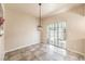 Dining room with tile floors and sliding glass door to patio at 337 Seine Way # 0, Henderson, NV 89014