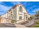 Two-story stucco home with arched windows and walkway at 337 Seine Way # 0, Henderson, NV 89014