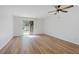 Bright and spacious bedroom featuring sliding glass doors and laminate wood floors at 3823 S Maryland Pkwy # C3, Las Vegas, NV 89119