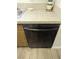 Modern black dishwasher installed in a kitchen with light wood flooring at 3823 S Maryland Pkwy # C3, Las Vegas, NV 89119