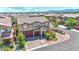 Two-story house with two-car garage, aerial view at 4165 Kerberos Ave, North Las Vegas, NV 89084