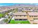 Aerial view of house with covered patio and yard at 4165 Kerberos Ave, North Las Vegas, NV 89084