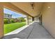 Covered patio overlooking a grassy backyard at 4165 Kerberos Ave, North Las Vegas, NV 89084