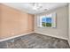 Bright bedroom with two-toned walls, carpeting, and a window with shutters at 4165 Kerberos Ave, North Las Vegas, NV 89084