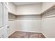 Large walk-in closet with double hanging rods at 4165 Kerberos Ave, North Las Vegas, NV 89084