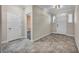 Bright entryway with tile flooring and neutral color palette at 4165 Kerberos Ave, North Las Vegas, NV 89084