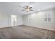 Spacious living room with ceiling fan and neutral decor at 4165 Kerberos Ave, North Las Vegas, NV 89084