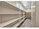 Large walk-in pantry with ample shelving at 4165 Kerberos Ave, North Las Vegas, NV 89084