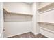 Large walk-in closet with wooden shelving at 4165 Kerberos Ave, North Las Vegas, NV 89084