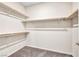 Large walk-in closet with wooden shelving at 4165 Kerberos Ave, North Las Vegas, NV 89084