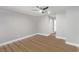 Spacious bedroom features wood floors, a ceiling fan and neutral paint at 4321 Mott Cir, Las Vegas, NV 89102