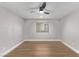 Neutral bedroom with ceiling fan and backyard window with natural light at 4321 Mott Cir, Las Vegas, NV 89102