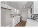 Bright, white kitchen with stainless steel appliances and modern countertops at 4321 Mott Cir, Las Vegas, NV 89102