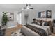 Serene main bedroom features a calming decor, modern ceiling fan, and neutral color palette at 4321 Mott Cir, Las Vegas, NV 89102