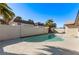 Backyard with a refreshing private pool and mature palms at 4321 Mott Cir, Las Vegas, NV 89102