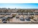 Charming single-story homes line a quiet street with the city skyline visible in the distance at 4321 Mott Cir, Las Vegas, NV 89102