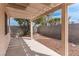Private backyard space with a covered patio and low-maintenance landscaping at 4507 Golden Palomino Ln, North Las Vegas, NV 89032