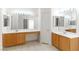 Bright bathroom featuring double sinks, lots of mirror space, and tile flooring at 4507 Golden Palomino Ln, North Las Vegas, NV 89032