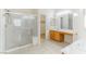Clean bathroom featuring a glass shower, toilet, and vanity with tile flooring at 4507 Golden Palomino Ln, North Las Vegas, NV 89032