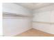 Spacious walk-in closet with built-in shelving and wood-style flooring at 4507 Golden Palomino Ln, North Las Vegas, NV 89032