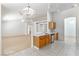 Open kitchen showcasing ample countertop space, tile floors, and stainless-steel appliances at 4507 Golden Palomino Ln, North Las Vegas, NV 89032