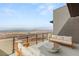 Inviting balcony featuring comfortable seating and incredible city views at 506 Overlook Rim Dr, Henderson, NV 89012