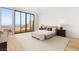 Minimalist bedroom with a large window, offering panoramic city views at 506 Overlook Rim Dr, Henderson, NV 89012