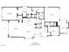 Main floor plan featuring a living room, dining room, kitchen, primary bedroom, and three-car garage at 506 Overlook Rim Dr, Henderson, NV 89012