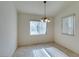 Dining area features tile floors and a hanging chandelier light fixture at 5582 Little Lake Ave, Las Vegas, NV 89122