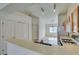 Kitchen area features breakfast bar and stainless steel appliances at 5582 Little Lake Ave, Las Vegas, NV 89122