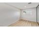 Well-lit bedroom featuring wood-look floors at 601 Sierra Ln, Henderson, NV 89002