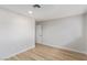 Bedroom features wood-look flooring, neutral paint, and base trim, ready for your personal touch at 601 Sierra Ln, Henderson, NV 89002