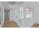 Bright entryway with glass doors and wood-look floors at 601 Sierra Ln, Henderson, NV 89002