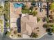 Aerial view of two-story house, pool, and landscaped yard at 6165 Smarty Jones Ave, Las Vegas, NV 89131