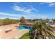 Home with pool and putting green, aerial view at 6165 Smarty Jones Ave, Las Vegas, NV 89131