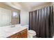 Bathroom with shower/tub combo and updated vanity at 6165 Smarty Jones Ave, Las Vegas, NV 89131